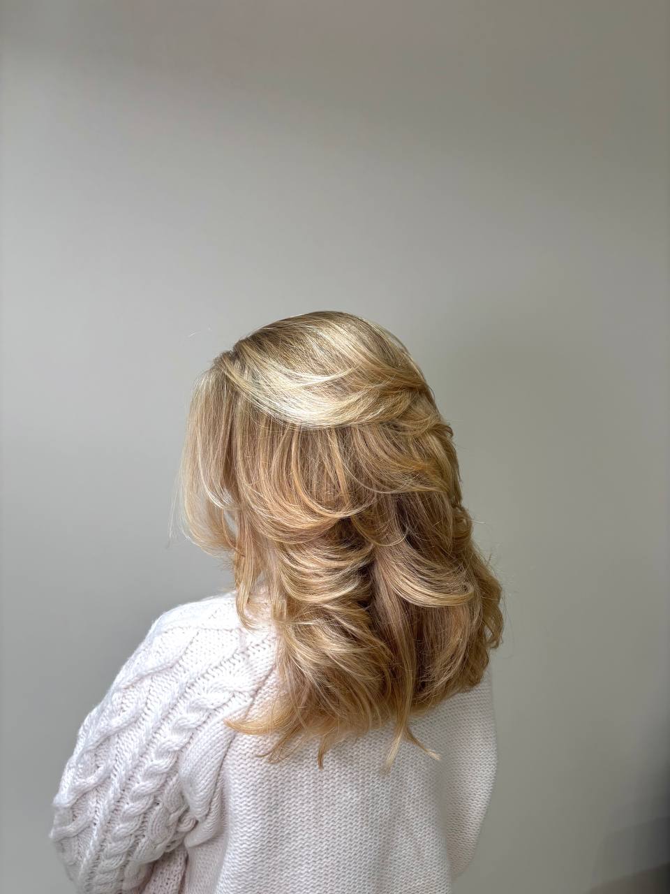 Soft blonde balayage & layered blowout